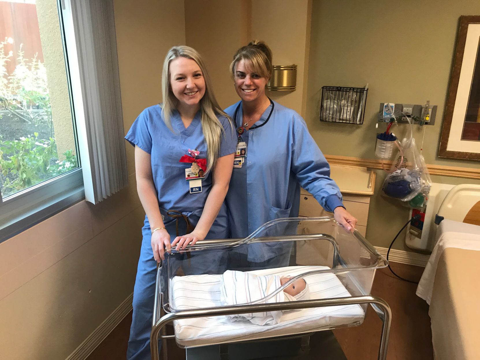 Queen labor and delivery nurses Madeline Hill and Judy Towe